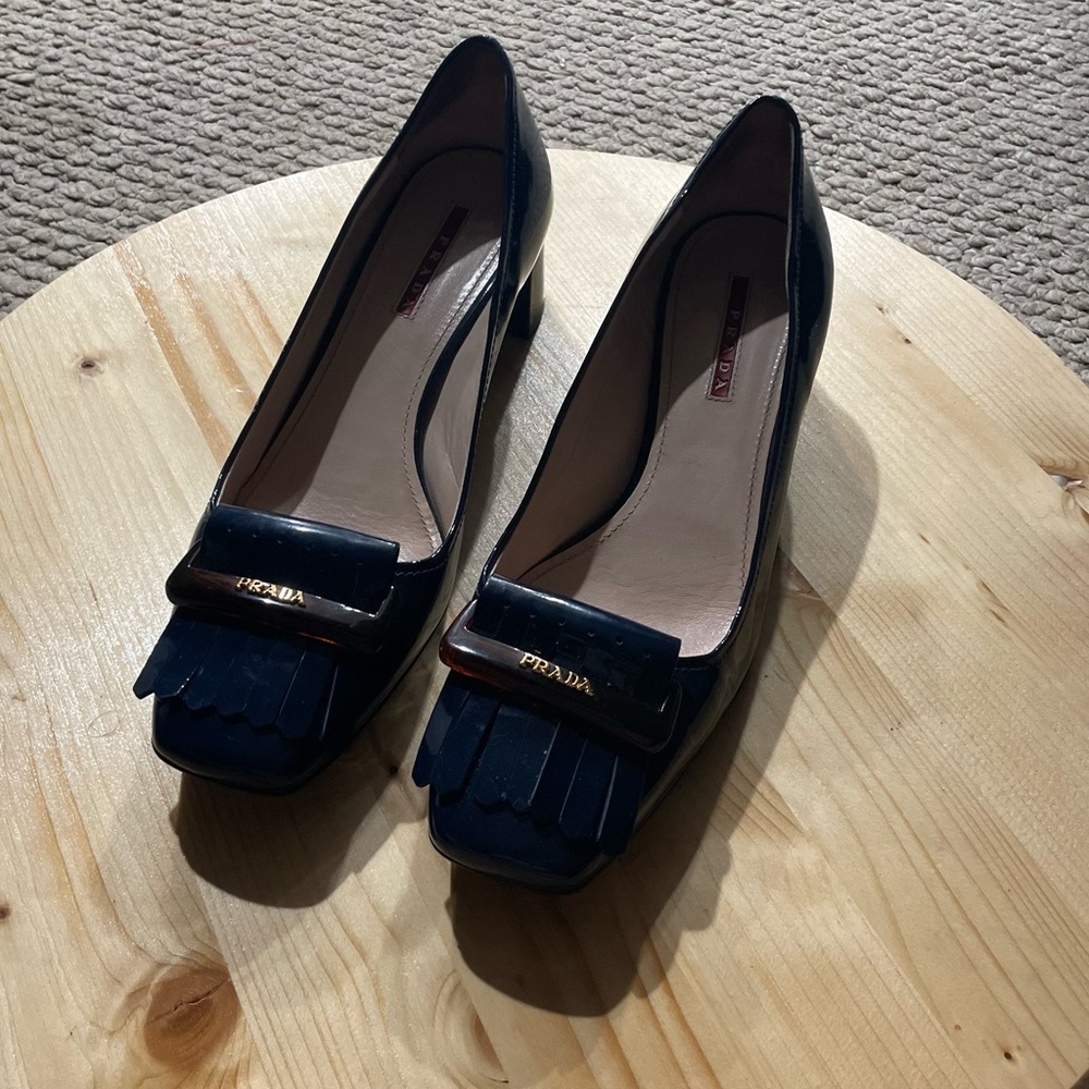 Prada "Kiltie" Navy Blue Patent Leather Pumps Size 40EU New With Dustbags